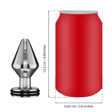a red can next to a metal object